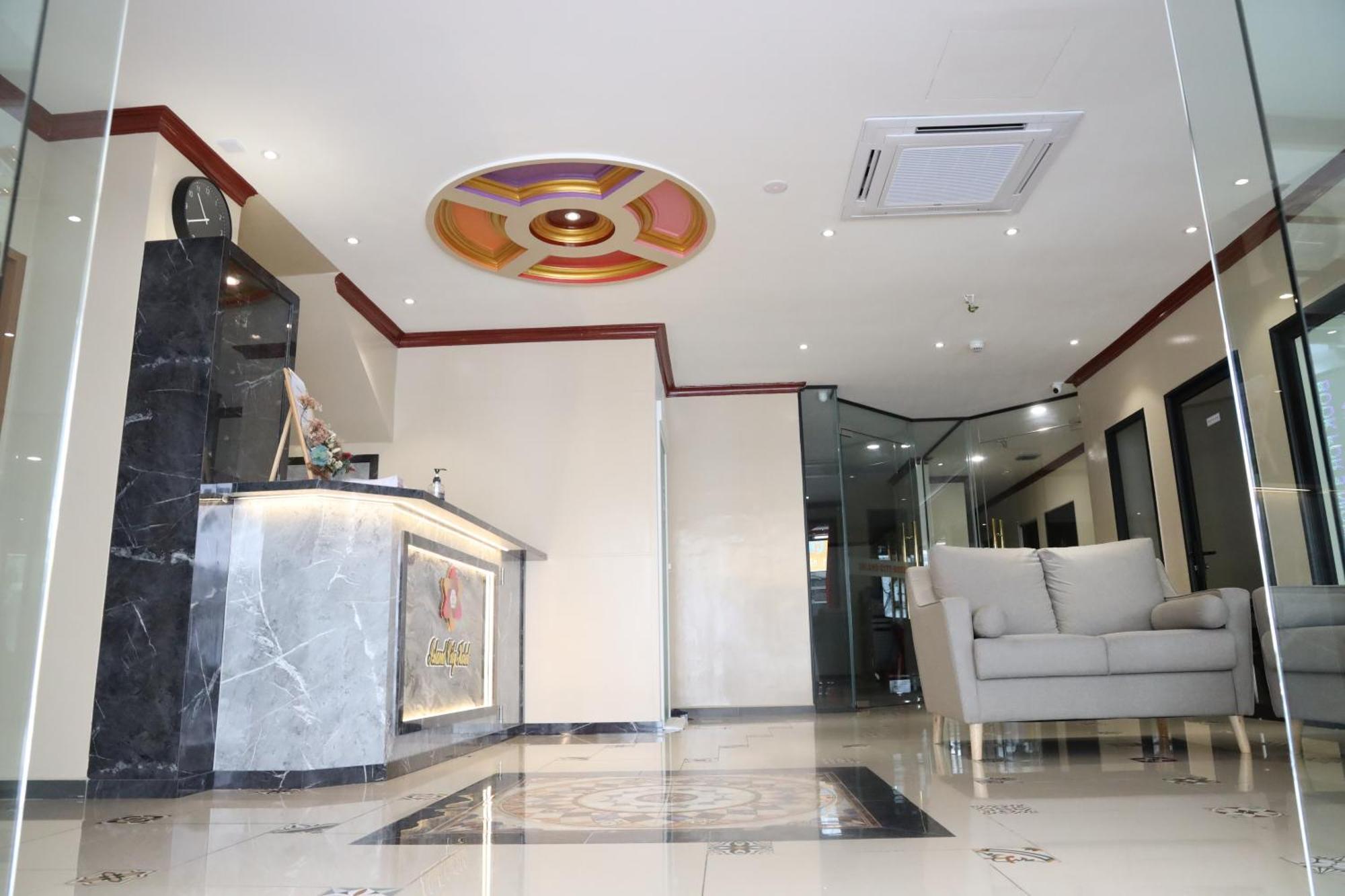 Capital O 90897 Island Hotel